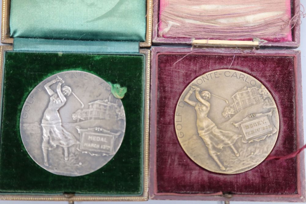 A 1920s silver ladies golfing medal and another similar bronze medal, both boxed